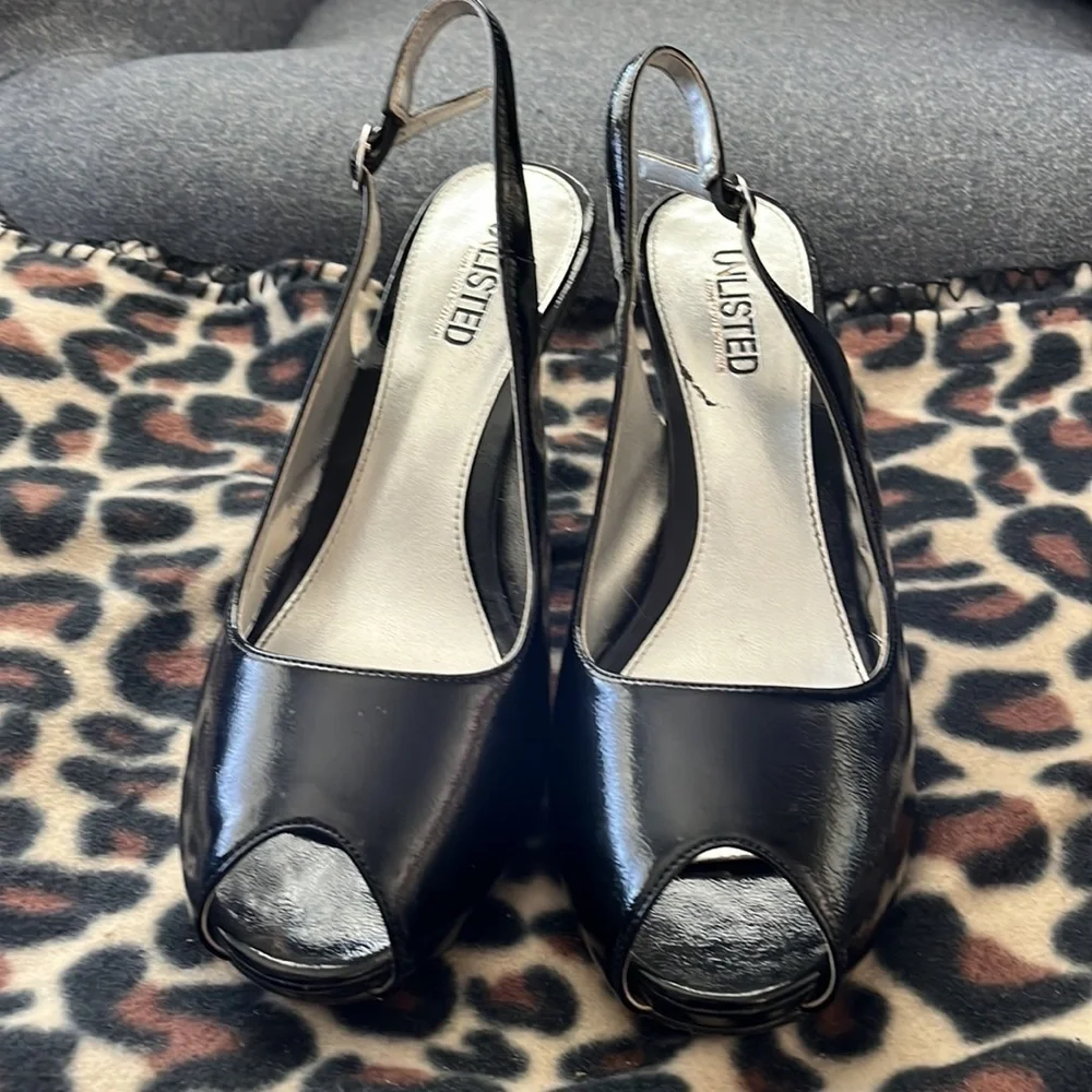 Unlisted Kenneth Cole peep toe sling back black patten leather looking shoe.  9